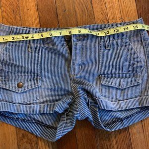 Striped, faded denim shorts